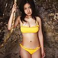 Busty teen idol Saaya Irie at the beach in her sexy bikini - image 