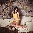 Busty teen idol Saaya Irie at the beach in her sexy bikini - image 