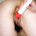 Japanese amateur teen masturbating her hairy pussy - image 