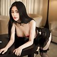Chinese girl looks totally sexy in lingerie, panties, stockings - image 