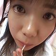 Super cute Asian teen with huge eyes sucking dick - image 