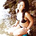 Busty teen idol Saaya Irie at the beach in her sexy bikini - image 