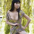 Wang A sexy Chinese girl naked outdoors - image 