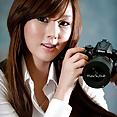 Hwang Mi Hee with her Nikon Canon camera - image 