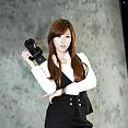 Hwang Mi Hee with her Nikon Canon camera - image 