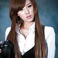 Hwang Mi Hee with her Nikon Canon camera - image 