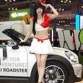 Sexy Korean race queen Hwang Mi Hee looking sexy at carshow - image 