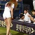 Korean baseball babe throws a pitch - image 