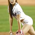 Korean baseball babe throws a pitch - image 