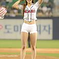 Korean baseball babe throws a pitch - image 