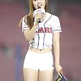 Korean baseball babe throws a pitch - image 