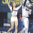 Korean baseball babe throws a pitch - image 