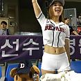 Korean baseball babe throws a pitch - image 